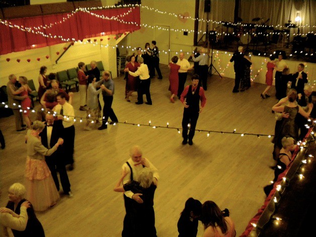 Valentine’s Day revelers dance the night away guided by dance instructor Walter Dill at last year’s Sweetheart Ball at Bayview Community Hall.