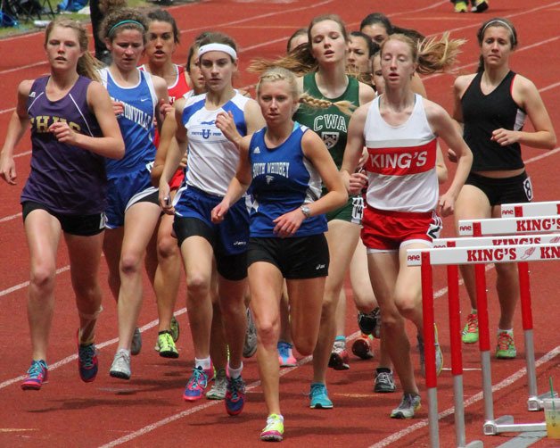 Lillianna Stelling heads a pack of runners at the 1A tri-district meet last week. The Falcon senior distance runner qualified for the state meet in the 3