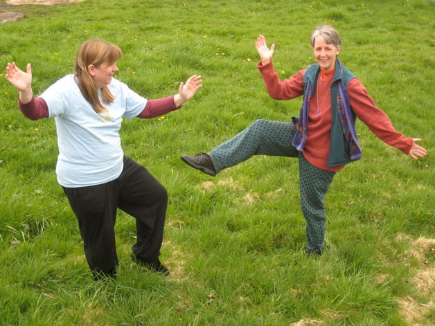 Lynne Donnelly and Shirley Jantz get a bit of tai chi practice in before “World Tai Chi/Qigong Day” on Saturday