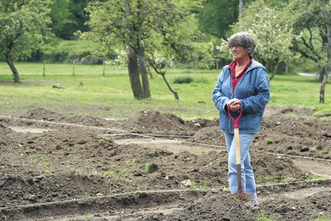 Dorothy Anderson stands in the new Langley Community Garden. Anderson provided the land for the project