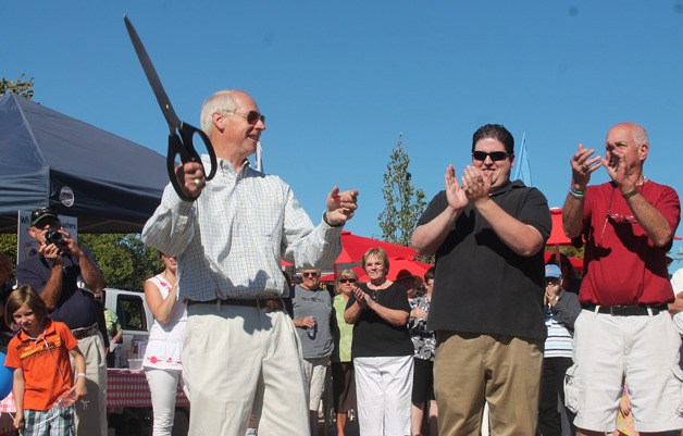 Langley Mayor Fred McCarthy snipped the scissors