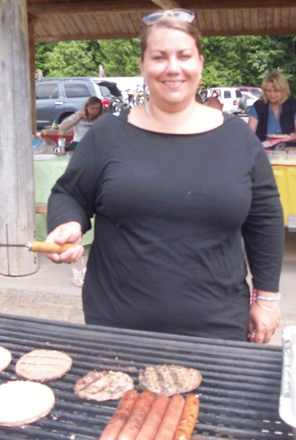 Annie Rundberg earned Volunteer of the Month for August at Family Resource Center. She grilled all the food for the last Relatives as Parents group meeting in Castle Park.