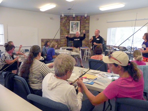 Volunteer instructors Kevin Lungren (left) and Ken Berry taught 23 women the basics of salmon fishing from shore at Trinity Lutheran Church’s Fishinista workshop held Aug. 8. The next class will be held Aug. 23 from 2 to 5 p.m. and will include a hands-on salmon filleting lesson by Jerry Shimek.