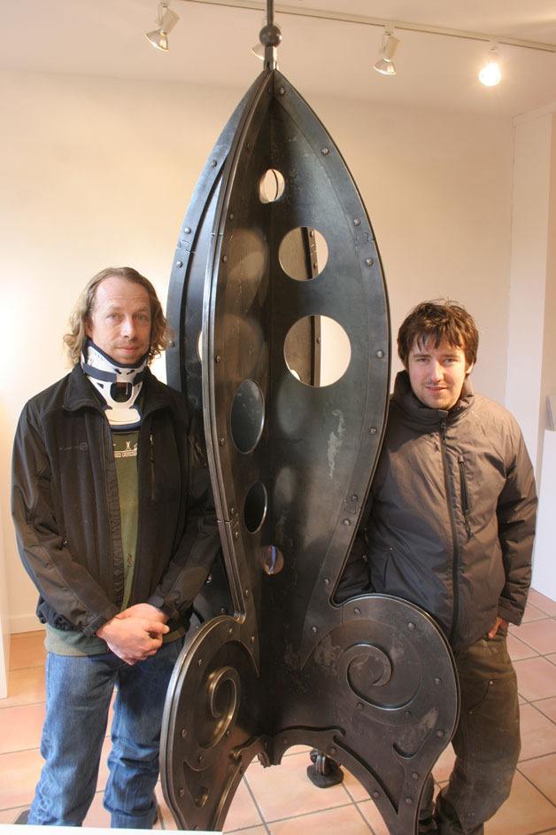 Tim Leonard stands next to the rocket ship called Zephyr that was named after his daughter