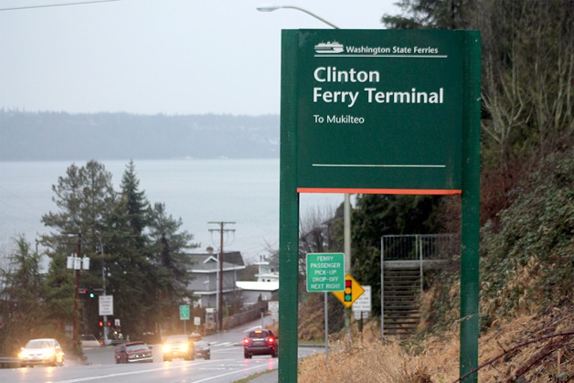 Motorists zip by a road sign at the Clinton Ferry Terminal. An effort led by a chamber volunteer to change the name of the terminal has been rejected
