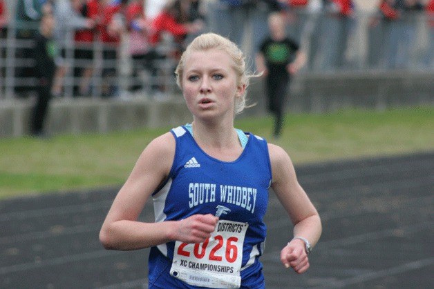 Lillianna Stelling approaches the finish line to secure her berth in the state 2A championship race.