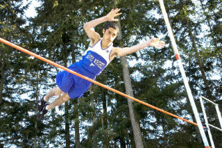 A season of training pays off as Ramsey O’Brien makes a successful vault — feet over the bar