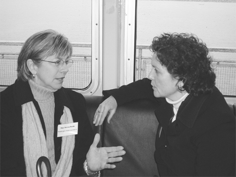 Rep. Norma Smith discusses ferry options with Secretary of Transportation Paula Hammond during the test run of the Steilacoom II.