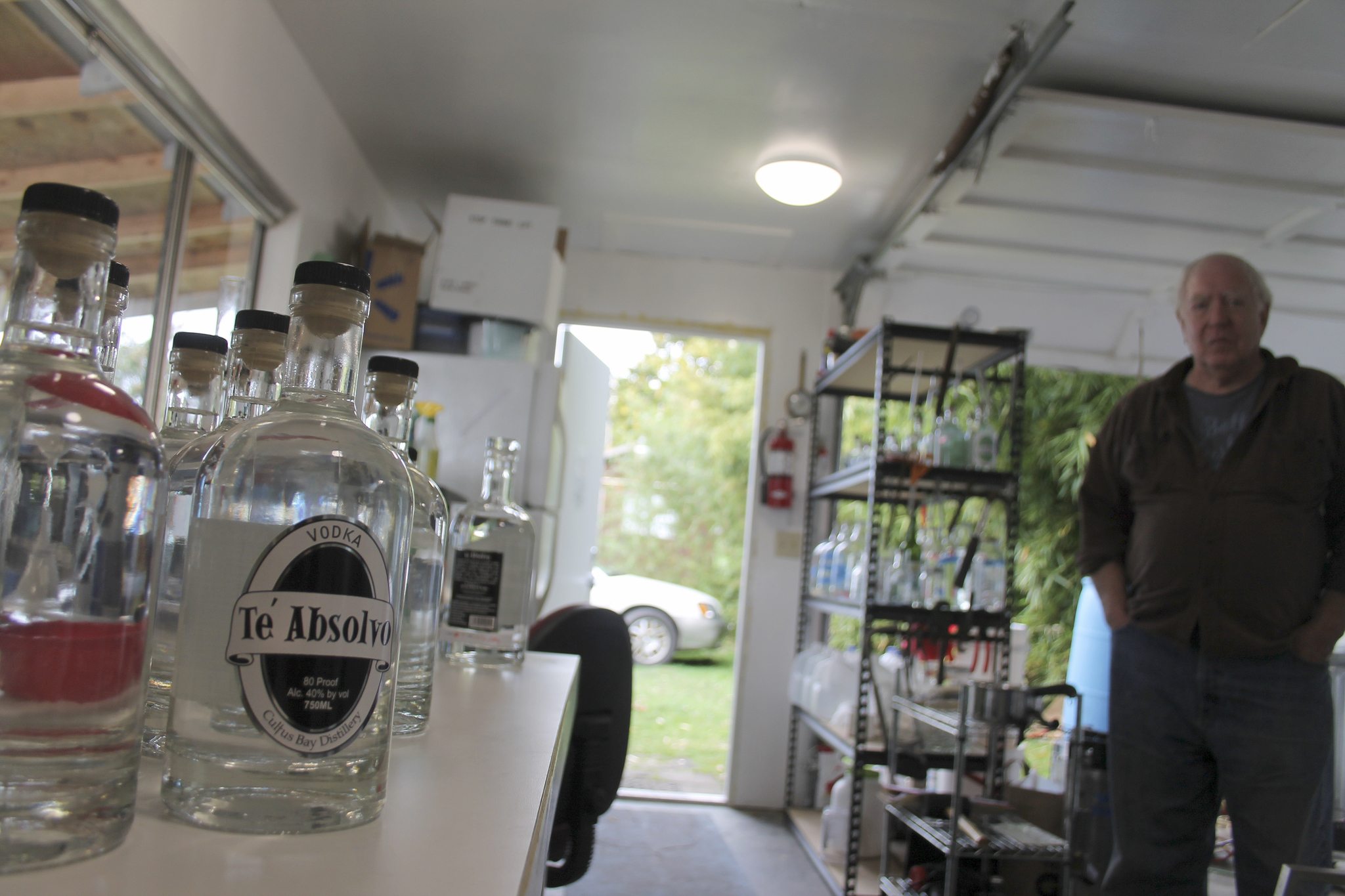 Photo by Kyle Jensen / Whidbey News Group                                Bob Brunjes stands in the distilling room, which operates out of a shed in co-owner Kathy Parks&rsquo; backyard.