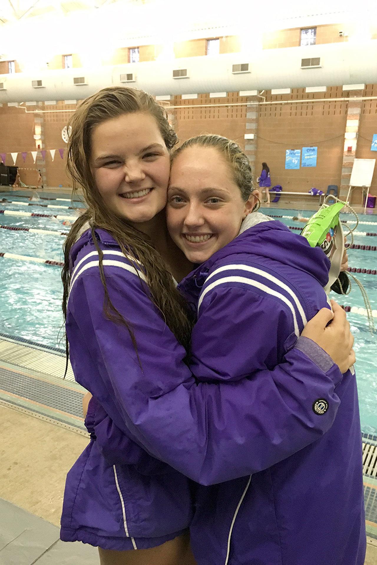 Evan Thompson / The Record                                South Whidbey&rsquo;s Kinsey Eager (left) and Ally Lynch (right) qualified for the Class 1A/2A girls swimming and diving state championships at a district meet this past weekend.