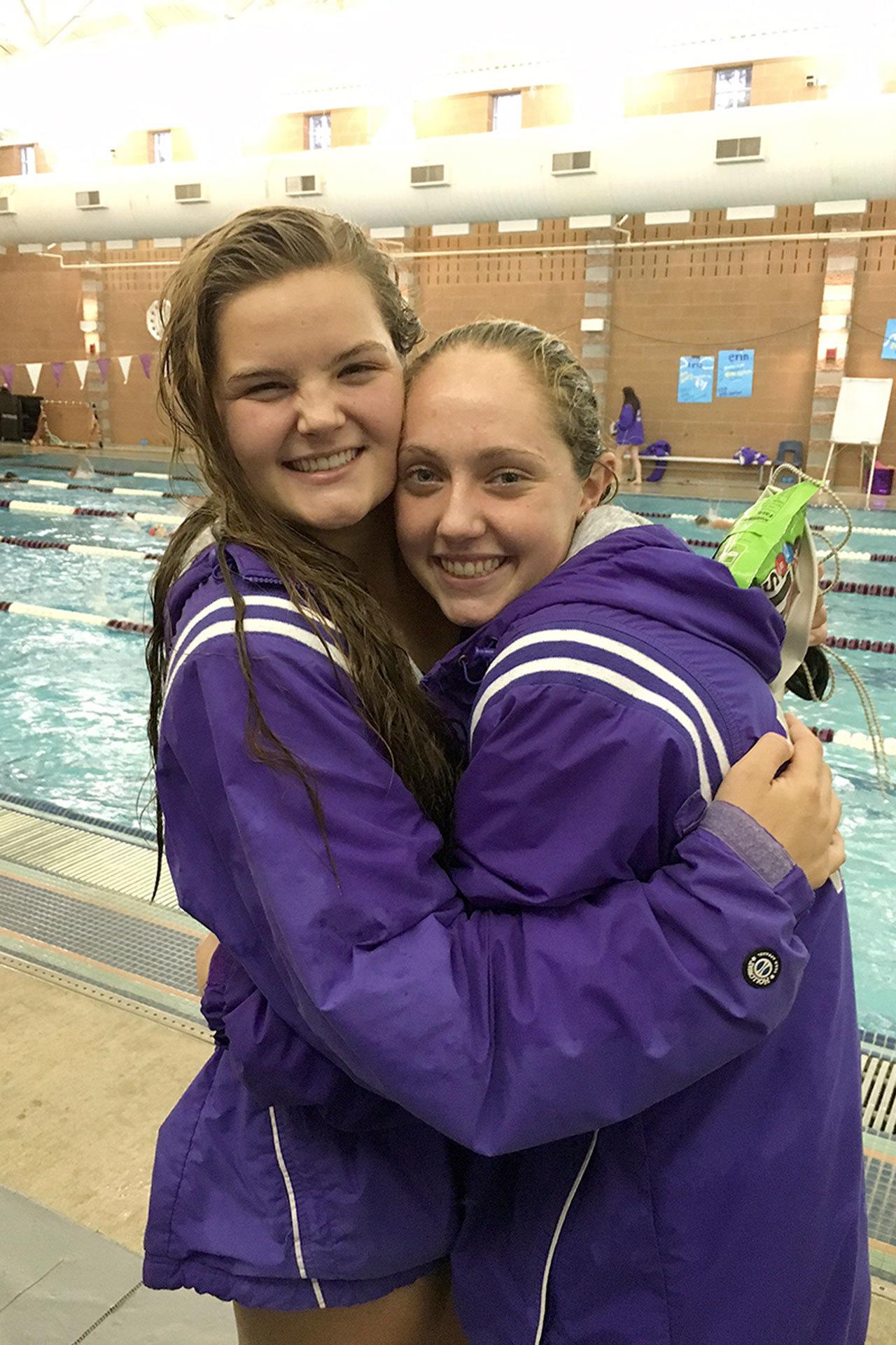 Evan Thompson / The Record                                South Whidbey’s Kinsey Eager (left) and Ally Lynch (right) qualified for the Class 1A/2A girls swimming and diving state championships at a district meet this past weekend.