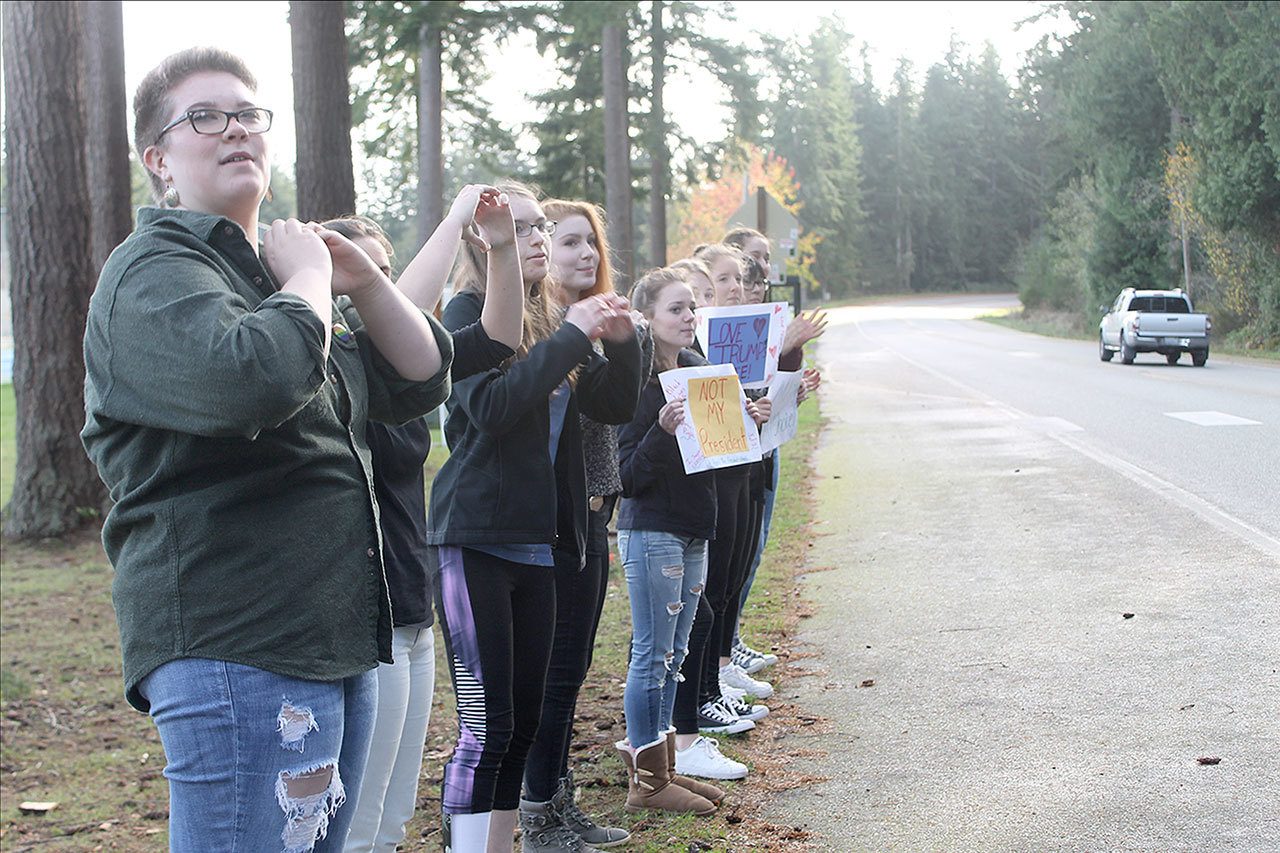 Evan Thompson / The Record                                Nine South Whidbey High School students protested the election of Donald Trump on Monday afternoon.