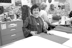 Island Fabrics Etc. owner Judy Martin serves customers in the shop when she is not busy buying fabric and accessories or teaching sewing classes.