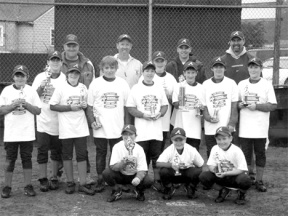 The 2007 Little League South Whidbey Braves show off their trophies after winning five straight games in Sedro-Woolley. In the front row are Keegan Warwick