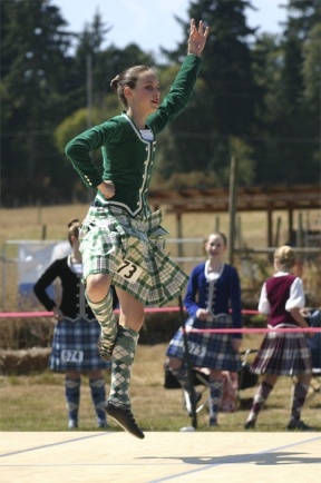 Californian Highland dancer Megan Ashworth bounds into the air during the 2006 dance competition of the Whidbey Island Highland Games. Dance teams from across the state descend on Whidbey Island for the Highland Games every year to show-off the intricate foot and hand-work that is required in Scottish dancing.