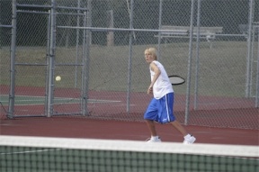 Riley Newman prepares to hit the ball during his match against Squalicum junior Jake Turk Thursday afternoon. Newman