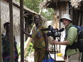Director of photography Sean Porter prepares to film Nigerian Helen Lelekumo