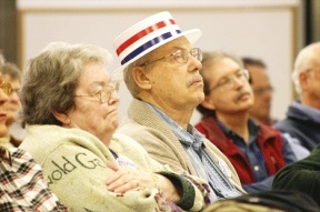 Donna and Bob West of Langley listen as candidates for Langley City Council talk at a voters forum Monday.