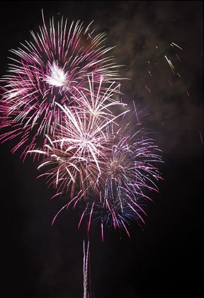 Fireworks explode over Holmes Harbor during the Celebrate America event at Freeland Park Wednesday night.