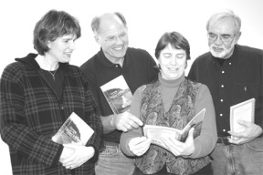 Reviewing the first copies of "Getting to the Water's Edge" are (from left) graphic designer Stacey Neumiller