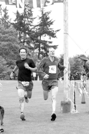 Frank Jacques and Peter Oakley cross the finish line in a dramatic tie for second place in the Chum Run.