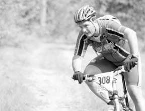 Tony Lombardo of Seattle heads into a turn at the halfway point of Sunday’s Mudder Race in Langley.