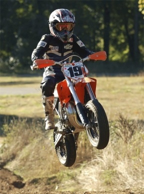Blake Deilke powers his KTM SX65 over a bump during a supermoto race last summer in Port Angeles. Supermoto is a crossover of road racing and motocross with the emphasis on slower