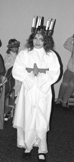 A tribute to Santa Lucia was presented by the children of St. Augustine’s Episcopal Church last Sunday. Tess Sawatski wears the traditional crown of candles as she portrays Lucia