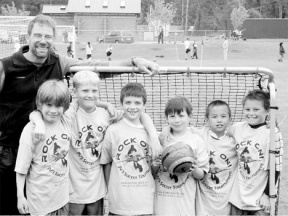 The U-9 boys team; from left: Coach Terry Swanson