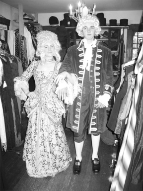 South Whidbey High School actors Zora Lungren and Rowan Firethorne don the 18th century garb they'll wear for "She Stoops to Conquer."