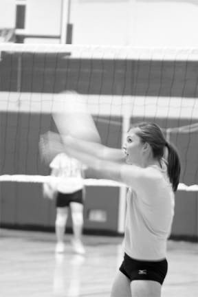 Senior Whitney Wood uses a classic double forearm volleyball move unique to the sport. On Sept. 19