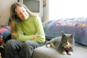 Lin Johnson sits with Randall this week after his rescue from a neighbor’s chimney.