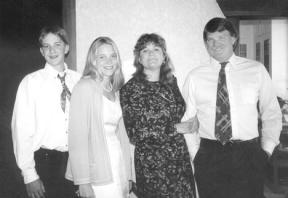 A graduation family photo of Ben Priest