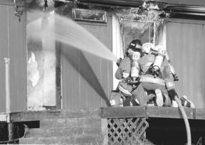 Volunteers got to hone their firefighting skills Tuesday during a drill exercise when a house on Crickett Lane off Goss Lake Road was partially burned for the training session.