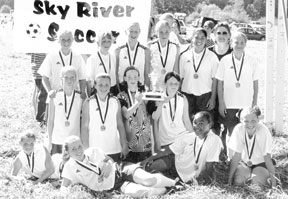 Posing with their trophy from the Skyriver Tournament won in September