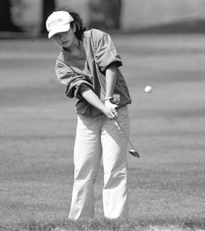 Junior Jennifer Pan shoots for par on the third hole at Useless Bay Thursday. Pan is undefeated in North Cascades Conference play this season.