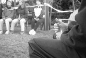 Strong winds allowed few candles to remain lit at the candlelight vigil Thursday at Langley Park