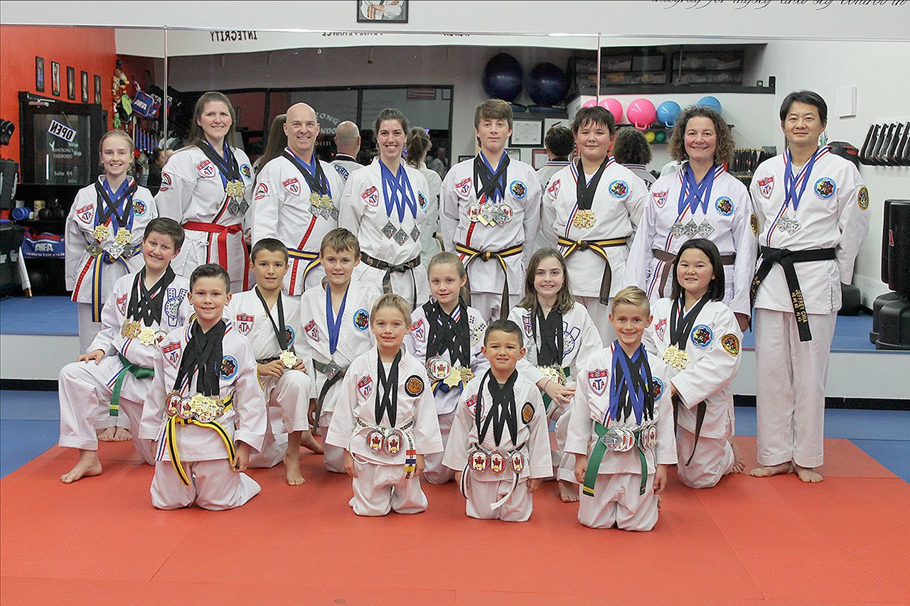 Contributed photo                                From left to right, back row: Julia Napoli, Amber Terrell, Mike Napoli, Jennifer Cisney, Dane Saxton, Joshua Chia, Stephine Chia, Jeffrey Chia. Middle row: Christian Terrell, Gavin Baker, Dustin Davis, Cassie Terrell, Karissa Napoli, Josephine Chia. Bottom row: Braxtyn Fleming, Gunnar Cisney, Tristan Diffie, Weston Dill.