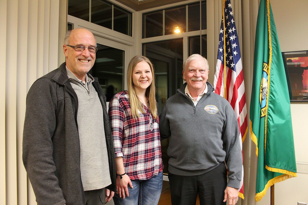 Kyle Jensen / The Record                                New South Whidbey Fire/EMS volunteers Mark Jabbusch (left) and Amanda Walsh joined the district alongside Chief Rusty Palmer (right).