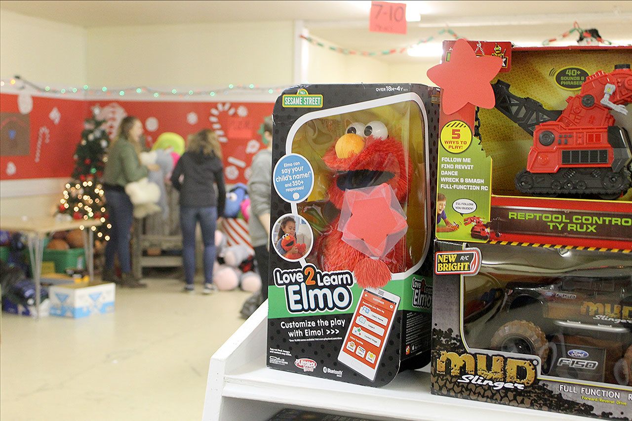 Evan Thompson / The Record                                Hundreds of toys will be given out to children who belong to families struggling through financial hardships at the 13th annual Holiday House in the Coffman Building at the Island County Fairgrounds.