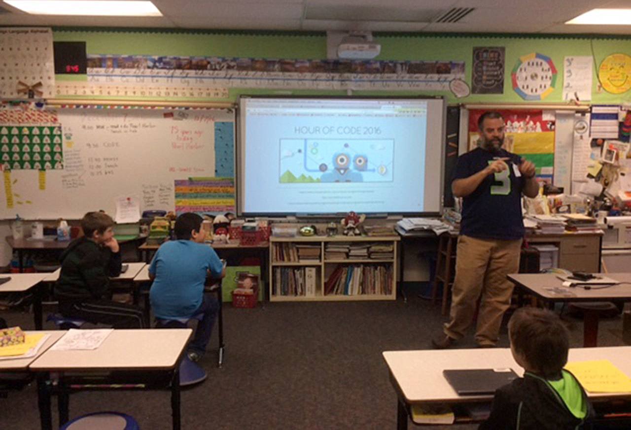 Contributed photo                                Aaron Racicot recently taught South Whidbey Elementary School students in Rachel Kizer’s class about coding.