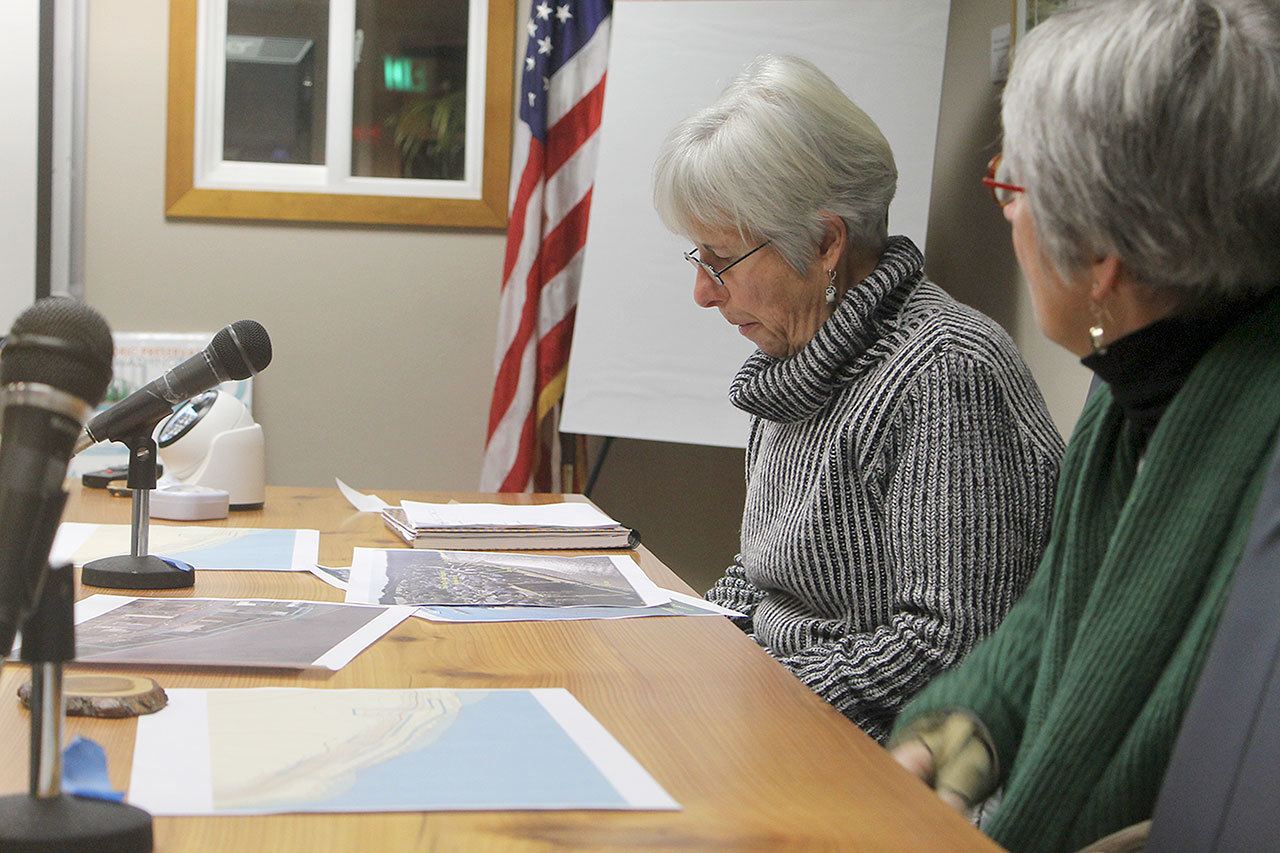 Evan Thompson / The Record                                Langley City Councilwoman Dominique Emerson examines a map of Seawall Park at a community discussion on Dec. 21.