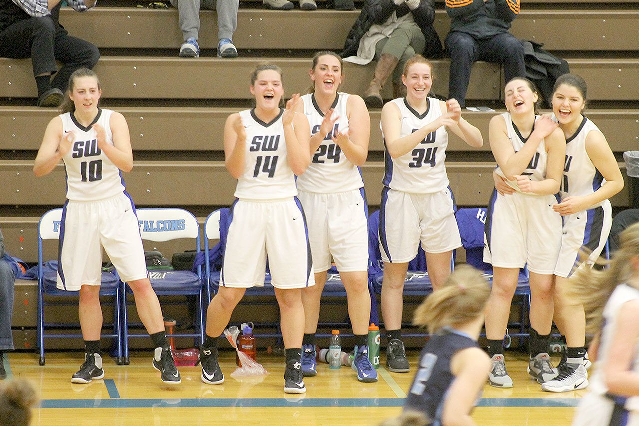 Evan Thompson / The Record                                South Whidbey girls basketball players celebrate two points scored by the Falcons against Sultan on Dec. 13. The Falcons earned two wins over Marsyville-Pilchuck and Oak Harbor on Dec. 27 and Dec. 29, respectively.
