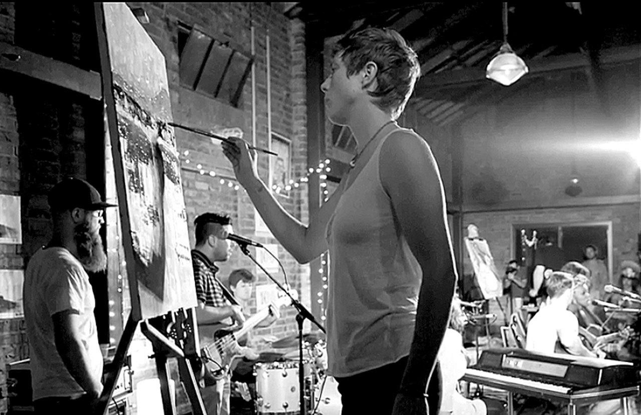 Contributed photo                                Fritha Strand performs live painting at a similar event. Strand has worked with The Round creator Nathan Marion for collaborative art events in Seattle.