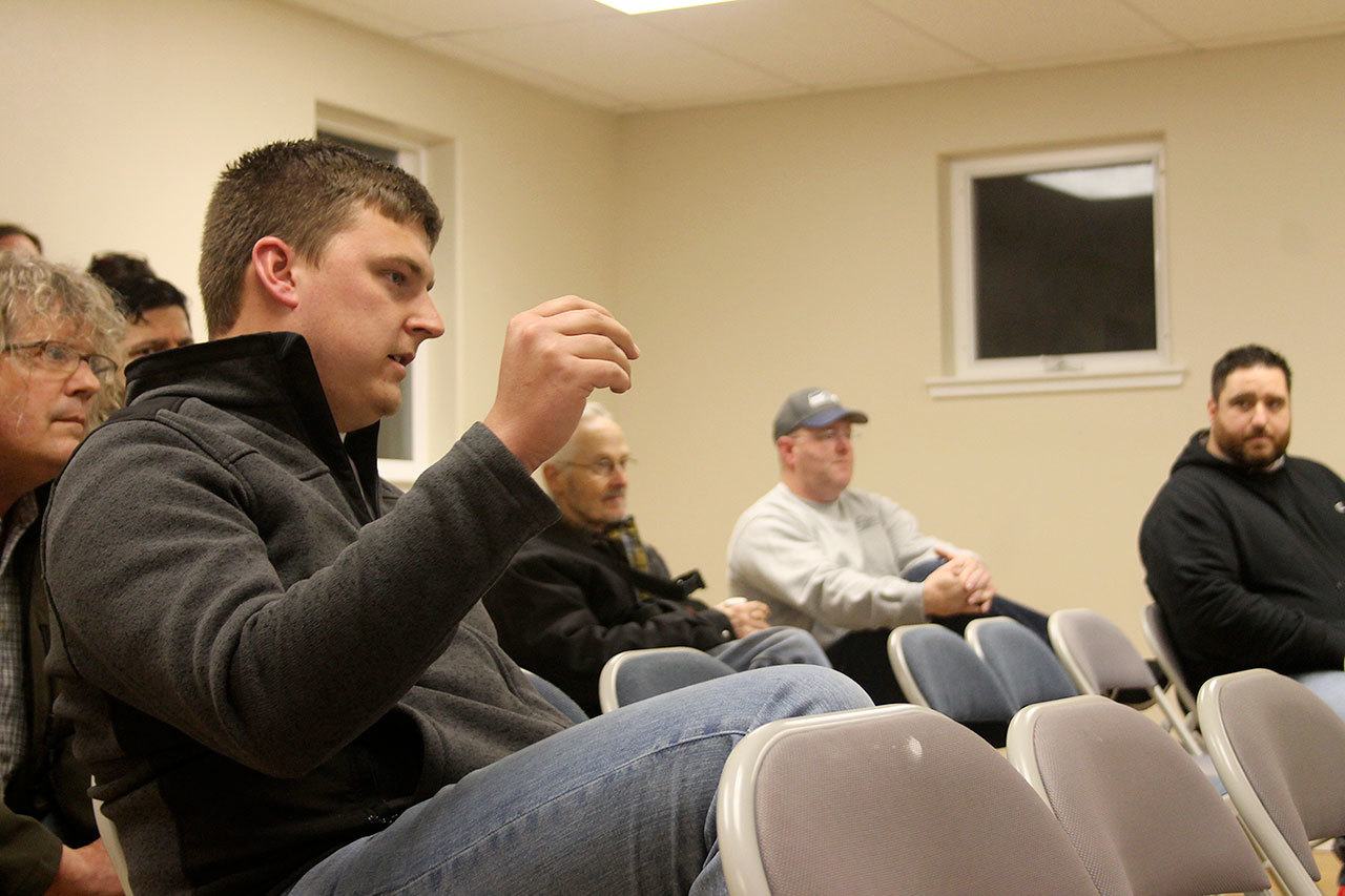 Kyle Jensen / The Record &mdash;                                South Whidbey Youth Soccer Club coach Karl Peterson explains why the Langley Middle School field is unsafe to play on. The club has had to train on the field while the South Whidbey Sports Complex fields are closed.