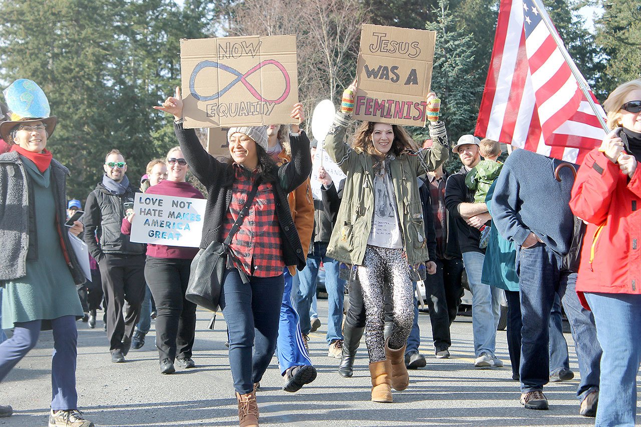 Evan Thompson / The Record — Protestors peacefully marched about two miles around Langley on Saturday. Others around the world did the same.