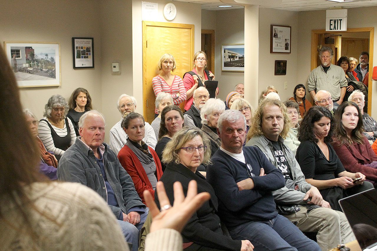 Evan Thompson / The Record — Attendees at a Langley City Council meeting Jan. 20 listen to Belinda Griswold of the citizens’ group “Sanctuary Langley.” The Langley City Council may adopt a resolution proposed by the city’s ethics board on Monday night that would indefinitely table sanctuary city status.