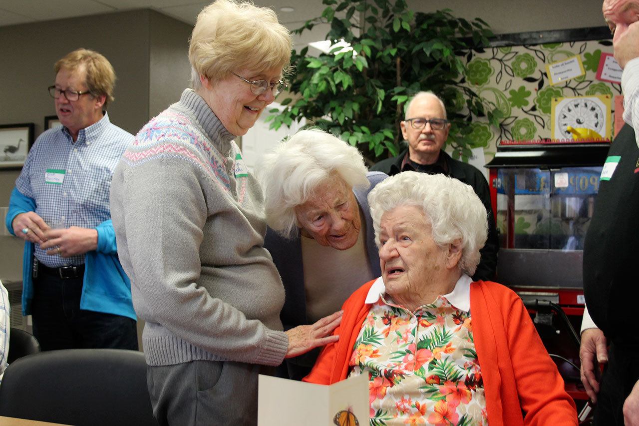 Kyle Jensen / The Record &mdash; Alta Brodie (right) is congratulated on her landmark birthday by daughter Marilyn Lueken (left) and friend Audrey Kasperson (center).