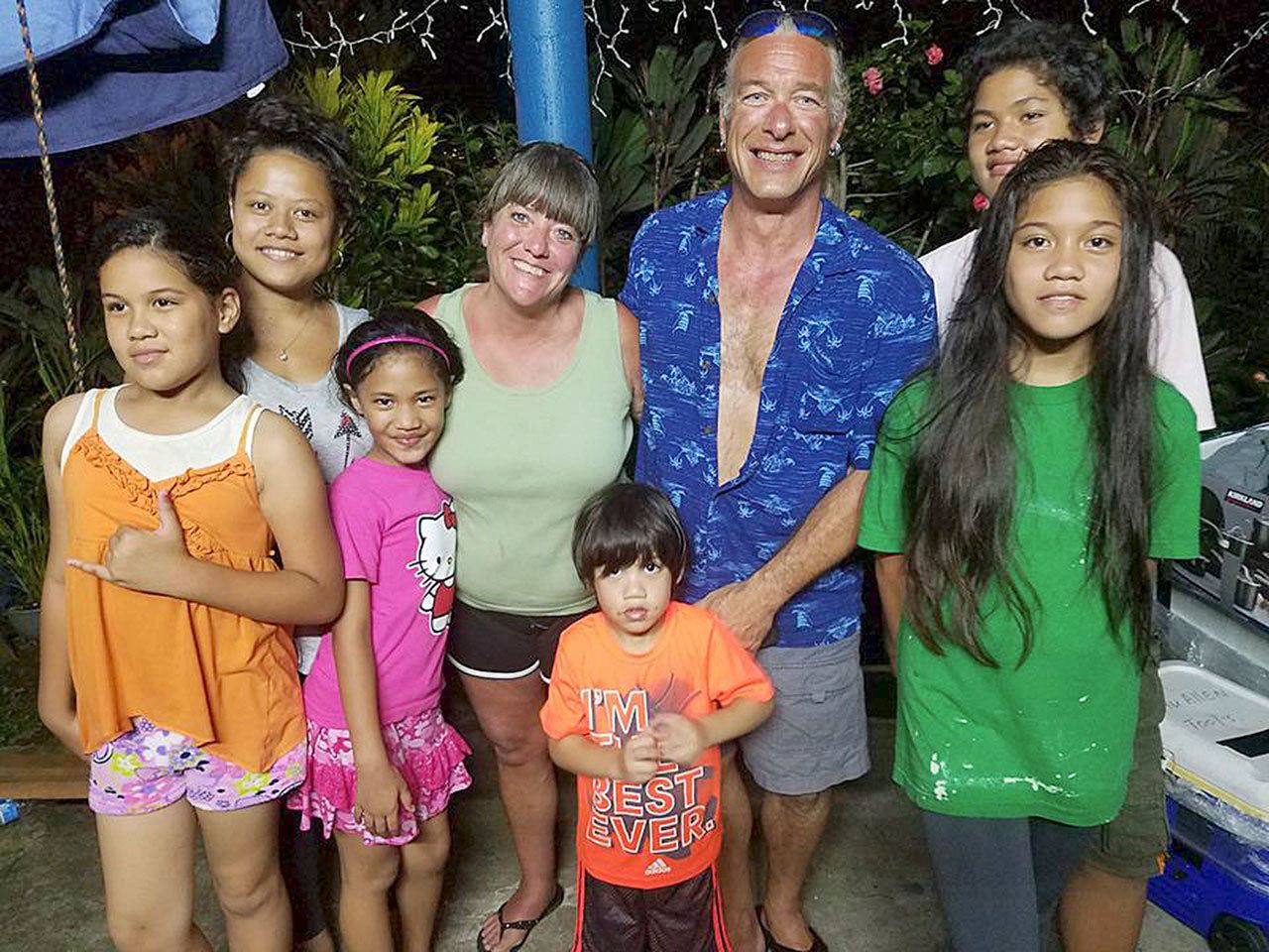 Contributed photo — Peggy and Jim Stach (center) made friends with their “new family” in American Samoa, the Allen family.
