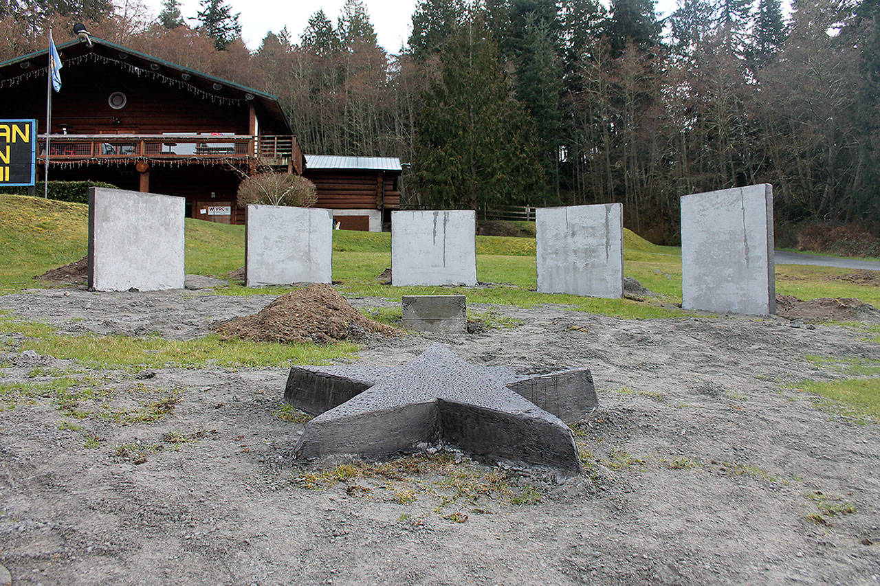 Kyle Jensen / The Record &mdash; The memorial for Whidbey Veterans is under construction. The five pillars represent &ldquo;the major wars,&rdquo; and the names of those lost in each war will be etched on the respective pillars.